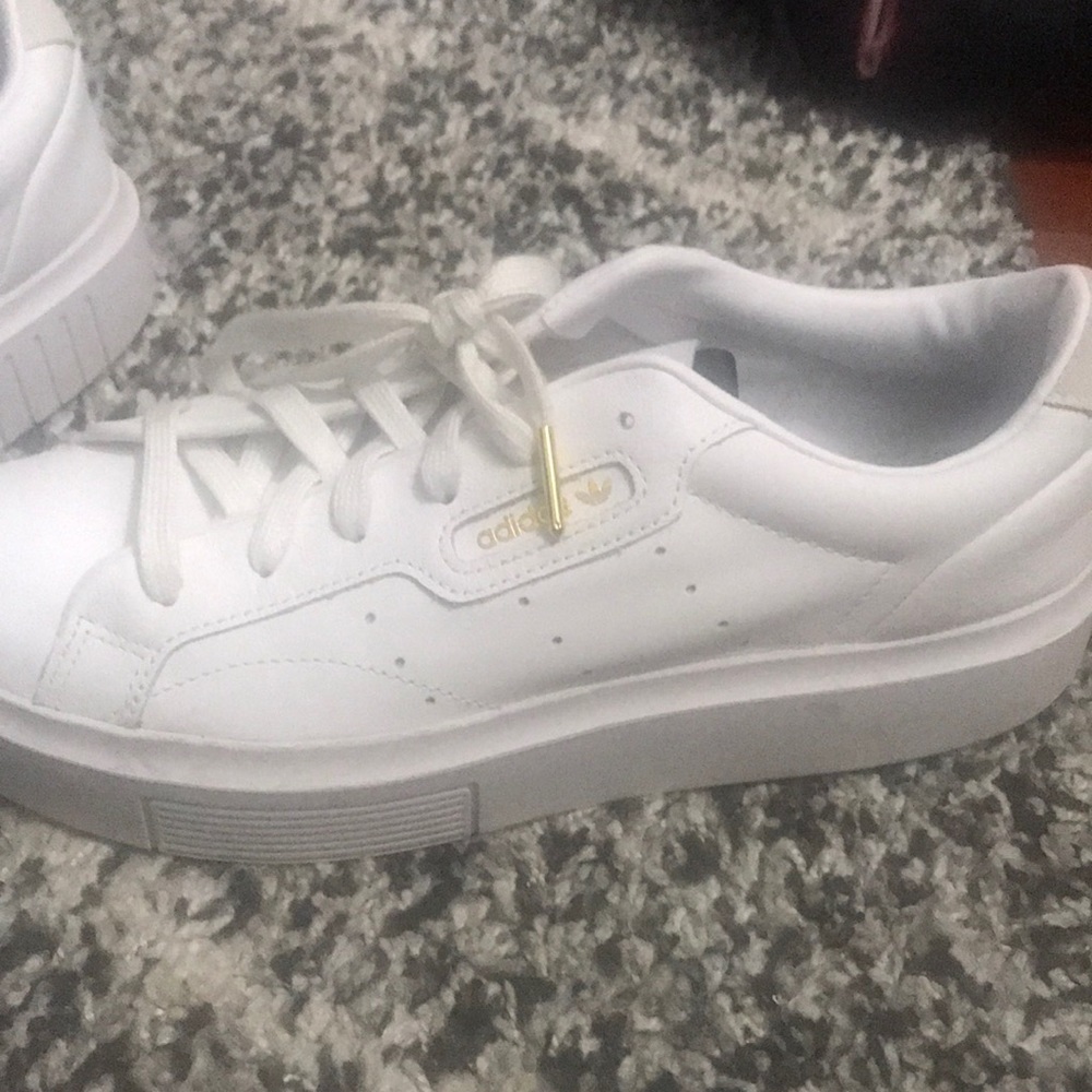 White adidas. Size 9.5. Only worn once! In great condition!
